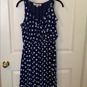 Polka dot dress with ruffle neckline
